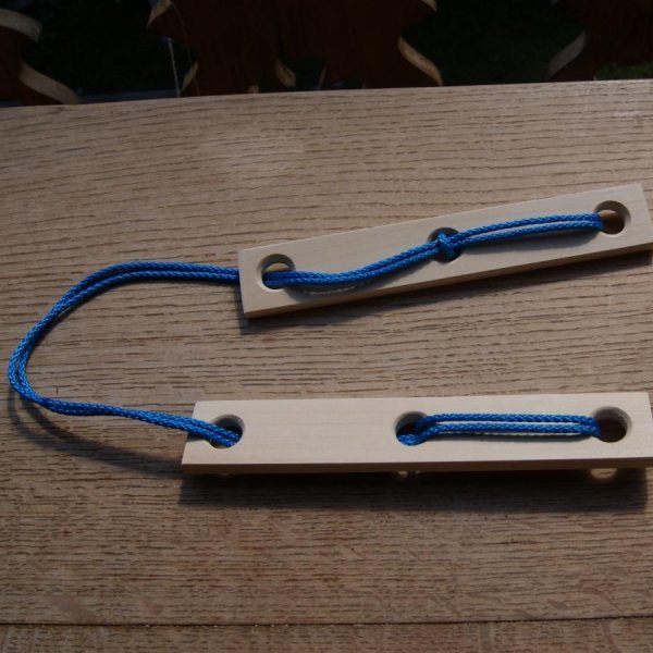 A madeira e o cordel do prisioneiro