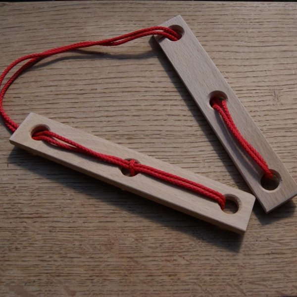 A madeira e o cordel do prisioneiro