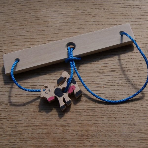 Quebra-cabe&ccedil;a La vache, madeira e cordel feito &agrave; m&atilde;o